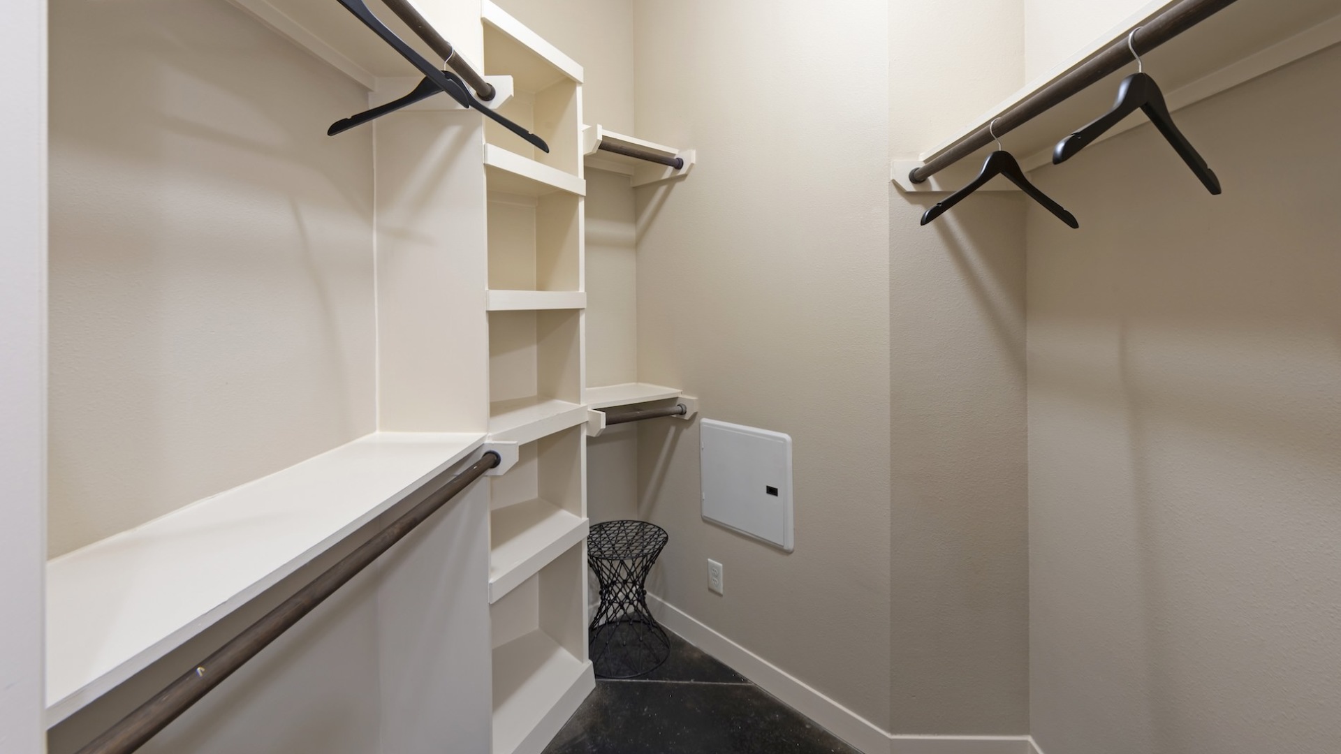 closet with shelves and hangers